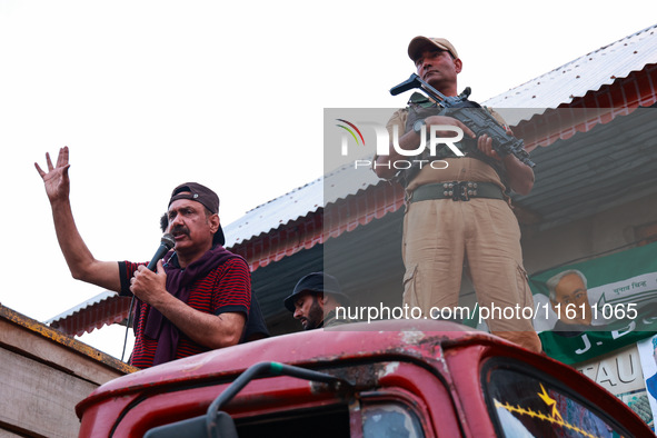 Peoples Democratic Party (PDP) leader Syed Basharat Bukhari addresses party workers during an election campaign in Baramulla, Jammu and Kash...