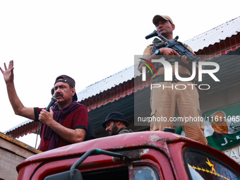 Peoples Democratic Party (PDP) leader Syed Basharat Bukhari addresses party workers during an election campaign in Baramulla, Jammu and Kash...