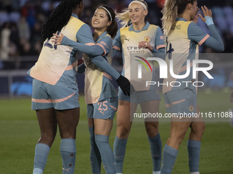 Khadija Shaw #21 of Manchester City W.F.C. celebrates her goal with teammates during the UEFA Women's Champions League Second Round 2nd Leg...