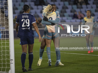 Khadija Shaw #21 of Manchester City W.F.C. celebrates her goal with Chloe Kelly #9 of Manchester City W.F.C. during the UEFA Women's Champio...