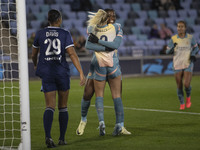 Khadija Shaw #21 of Manchester City W.F.C. celebrates her goal with Chloe Kelly #9 of Manchester City W.F.C. during the UEFA Women's Champio...