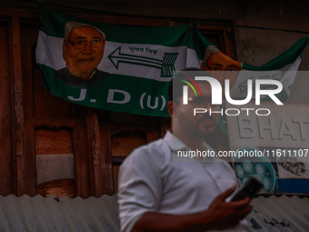 Nitish Kumar's Janata Dal (United) Indian political party flags are installed during assembly elections in Kreeri-Wagoora constituency in Ba...