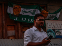 Nitish Kumar's Janata Dal (United) Indian political party flags are installed during assembly elections in Kreeri-Wagoora constituency in Ba...