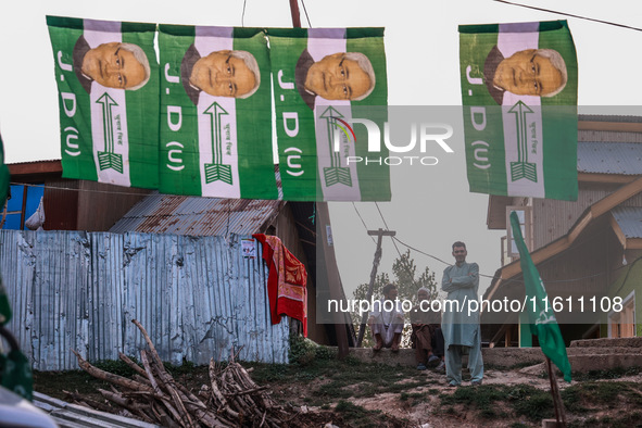 Nitish Kumar's Janata Dal (United) Indian political party flags are installed during assembly elections in Kreeri-Wagoora constituency in Ba...