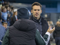 Manchester City W.F.C. manager Gareth Taylor shakes hands with Paris FC manager Sandrine Soubeyrand during the UEFA Women's Champions League...