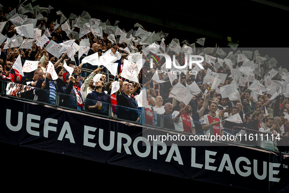 The atmosphere in the stadium during the match between Ajax and Besiktas at the Johan Cruijff ArenA for the UEFA Europa League - League phas...