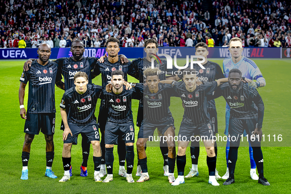 The Besiktas team poses for a photo during the match between Ajax and Besiktas at the Johan Cruijff ArenA for the UEFA Europa League - Leagu...