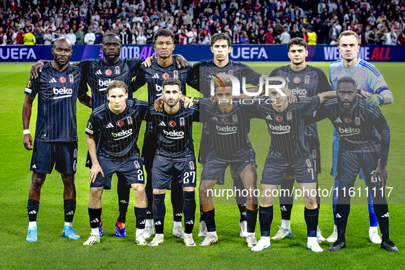 The Besiktas team poses for a photo during the match between Ajax and Besiktas at the Johan Cruijff ArenA for the UEFA Europa League - Leagu...