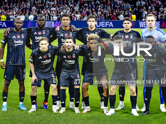 The Besiktas team poses for a photo during the match between Ajax and Besiktas at the Johan Cruijff ArenA for the UEFA Europa League - Leagu...