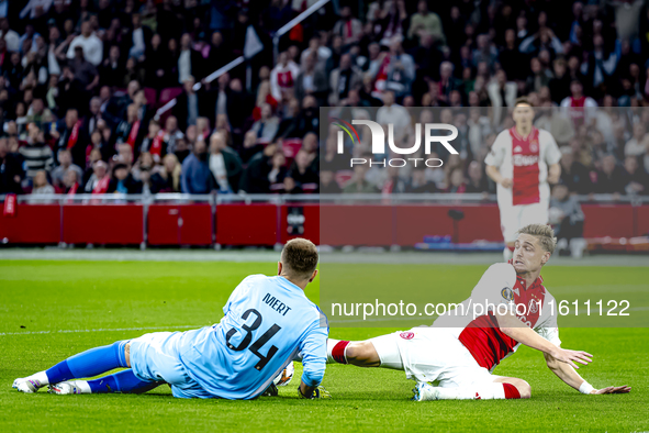 AFC Ajax Amsterdam midfielder Kenneth Taylor and Besiktas JK goalkeeper Mert Gunok during the match Ajax vs. Besiktas at the Johan Cruijff A...