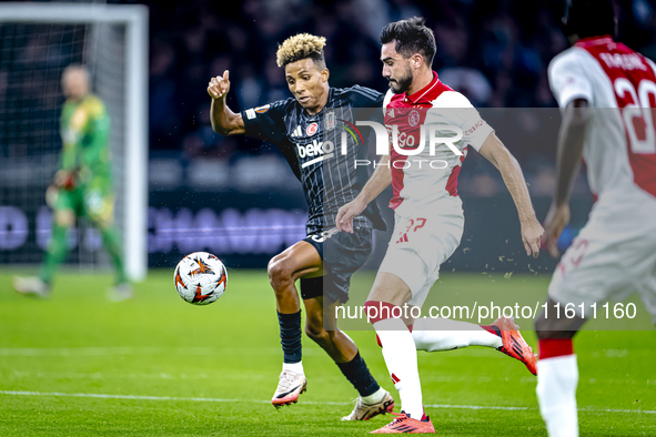 Besiktas JK midfielder Gedson Fernandes and AFC Ajax Amsterdam defender Josip Sutalo during the match between Ajax and Besiktas at the Johan...