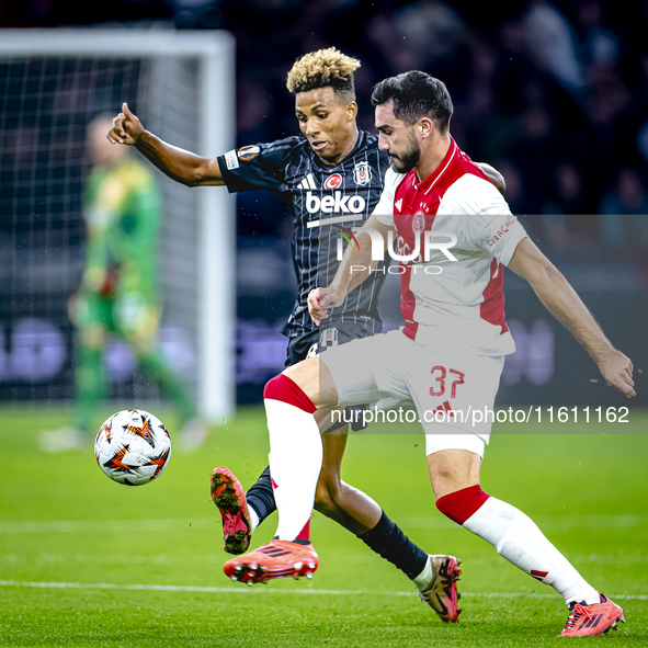 Besiktas JK midfielder Gedson Fernandes and AFC Ajax Amsterdam defender Josip Sutalo during the match between Ajax and Besiktas at the Johan...