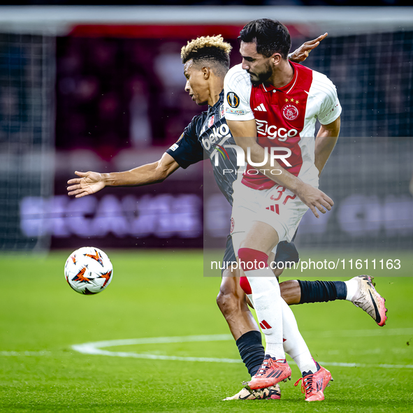 Besiktas JK midfielder Gedson Fernandes and AFC Ajax Amsterdam defender Josip Sutalo during the match between Ajax and Besiktas at the Johan...