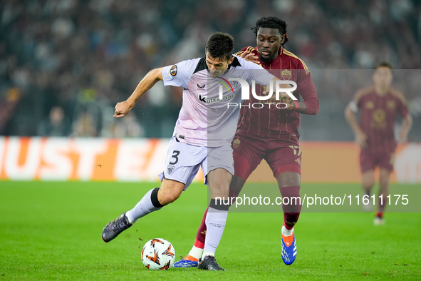 Daniel Vivian of Athletic Club and Manu Kone' of AS Roma compete for the ball during the UEFA Europa League 2024/25 League Phase MD1 match b...