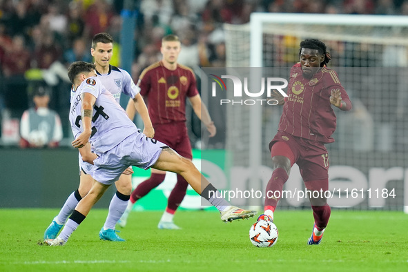 Benat Prados of Athletic Club and Manu Kone' of AS Roma compete for the ball during the UEFA Europa League 2024/25 League Phase MD1 match be...