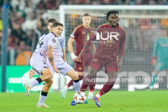 Benat Prados of Athletic Club and Manu Kone' of AS Roma compete for the ball during the UEFA Europa League 2024/25 League Phase MD1 match be...