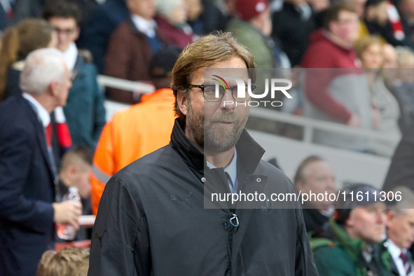 Jurgen Klopp, head coach of Borussia Dortmund, gestures prior to the UEFA Champions League Group D soccer match between Arsenal and Borussia...