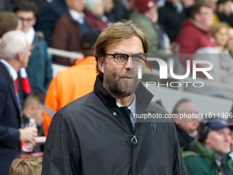 Jurgen Klopp, head coach of Borussia Dortmund, gestures prior to the UEFA Champions League Group D soccer match between Arsenal and Borussia...