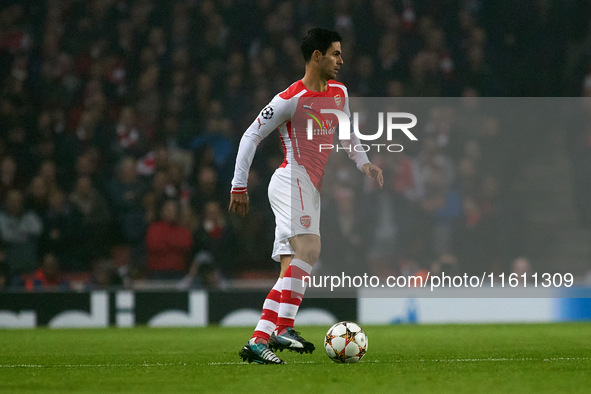 Mikel Arteta, captain of Arsenal, is in action during the UEFA Champions League Group D soccer match between Arsenal and Borussia Dortmund a...