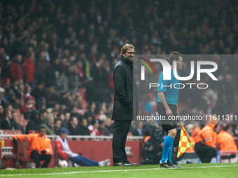 Jurgen Klopp, head coach of Borussia Dortmund, gestures during the UEFA Champions League Group D soccer match between Arsenal and Borussia D...