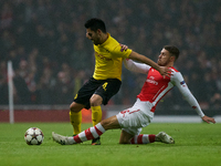 Ilkay Gundogan (L) of Borussia Dortmund competes for the ball with Aaron Ramsey (R) of Arsenal during the UEFA Champions League Group D socc...