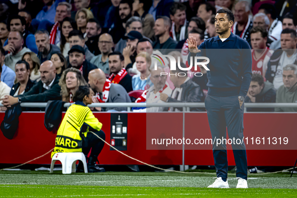 Besiktas JK trainer Giovanni Van Bronckhorst during the match between Ajax and Besiktas at the Johan Cruijff ArenA for the UEFA Europa Leagu...