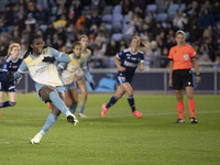 Khadija Shaw #21 of Manchester City W.F.C. scores from the penalty spot during the UEFA Women's Champions League Second Round 2nd Leg match...