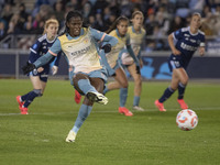 Khadija Shaw #21 of Manchester City W.F.C. scores from the penalty spot during the UEFA Women's Champions League Second Round 2nd Leg match...