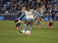 Khadija Shaw #21 of Manchester City W.F.C. scores from the penalty spot during the UEFA Women's Champions League Second Round 2nd Leg match...