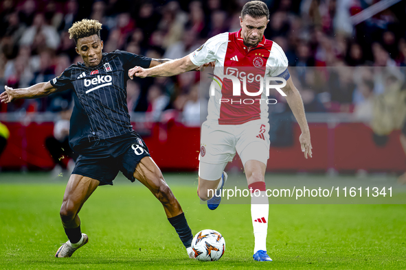 Besiktas JK midfielder Gedson Fernandes and AFC Ajax Amsterdam midfielder Jordan Henderson during the match between Ajax and Besiktas at the...