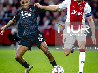 Besiktas JK midfielder Gedson Fernandes and AFC Ajax Amsterdam midfielder Jordan Henderson during the match between Ajax and Besiktas at the...