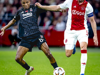 Besiktas JK midfielder Gedson Fernandes and AFC Ajax Amsterdam midfielder Jordan Henderson during the match between Ajax and Besiktas at the...