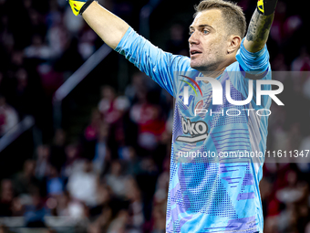 Besiktas JK goalkeeper Mert Gunok during the match between Ajax and Besiktas at the Johan Cruijff ArenA for the UEFA Europa League - League...