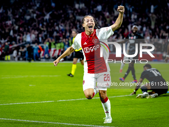 AFC Ajax Amsterdam midfielder Kian Fitz-Jim scores the 1-0 goal and celebrates during the match between Ajax and Besiktas at the Johan Cruij...