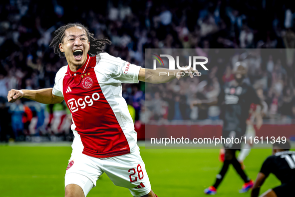 AFC Ajax Amsterdam midfielder Kian Fitz-Jim scores the 1-0 goal and celebrates during the match between Ajax and Besiktas at the Johan Cruij...