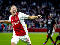 AFC Ajax Amsterdam midfielder Kian Fitz-Jim scores the 1-0 goal and celebrates during the match between Ajax and Besiktas at the Johan Cruij...