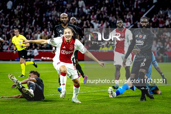 AFC Ajax Amsterdam midfielder Kian Fitz-Jim scores the 1-0 goal and celebrates during the match between Ajax and Besiktas at the Johan Cruij...