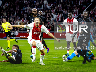 AFC Ajax Amsterdam midfielder Kian Fitz-Jim scores the 1-0 goal and celebrates during the match between Ajax and Besiktas at the Johan Cruij...