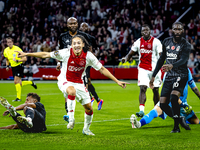 AFC Ajax Amsterdam midfielder Kian Fitz-Jim scores the 1-0 goal and celebrates during the match between Ajax and Besiktas at the Johan Cruij...