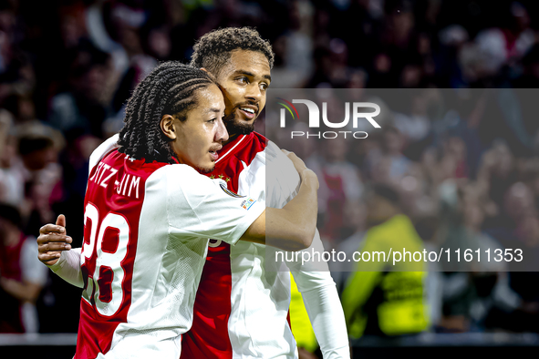 AFC Ajax Amsterdam midfielder Kian Fitz-Jim scores the 1-0 goal and celebrates during the match between Ajax and Besiktas at the Johan Cruij...