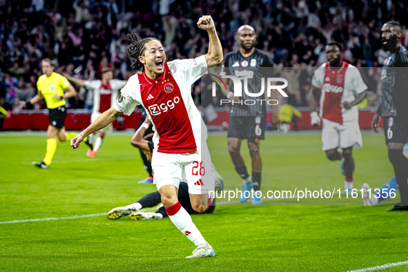 AFC Ajax Amsterdam midfielder Kian Fitz-Jim scores the 1-0 goal and celebrates during the match between Ajax and Besiktas at the Johan Cruij...