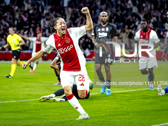 AFC Ajax Amsterdam midfielder Kian Fitz-Jim scores the 1-0 goal and celebrates during the match between Ajax and Besiktas at the Johan Cruij...