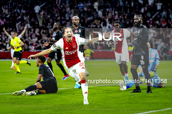 AFC Ajax Amsterdam midfielder Kian Fitz-Jim scores the 1-0 goal and celebrates during the match between Ajax and Besiktas at the Johan Cruij...