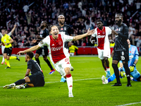 AFC Ajax Amsterdam midfielder Kian Fitz-Jim scores the 1-0 goal and celebrates during the match between Ajax and Besiktas at the Johan Cruij...