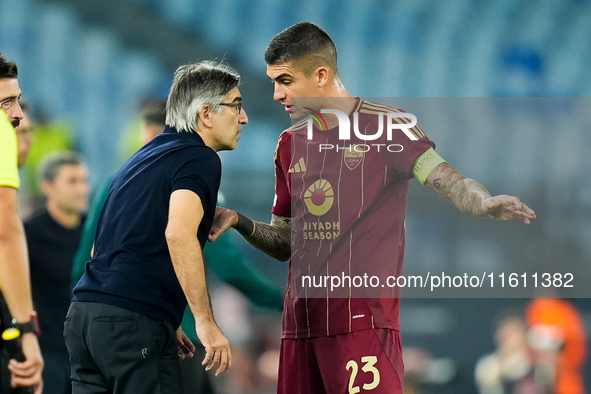 Ivan Juric head coach of AS Roma gives instructions to Gianluca Mancini of AS Roma during the UEFA Europa League 2024/25 League Phase MD1 ma...