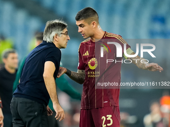 Ivan Juric head coach of AS Roma gives instructions to Gianluca Mancini of AS Roma during the UEFA Europa League 2024/25 League Phase MD1 ma...