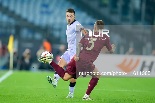 Benat Prados of Athletic Club and Angelino of AS Roma compete for the ball during the UEFA Europa League 2024/25 League Phase MD1 match betw...