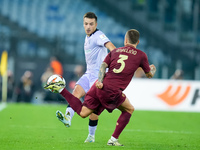 Benat Prados of Athletic Club and Angelino of AS Roma compete for the ball during the UEFA Europa League 2024/25 League Phase MD1 match betw...