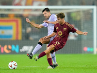 Daniel Vivian of Athletic Club and Tommaso Baldanzi of AS Roma compete for the ball during the UEFA Europa League 2024/25 League Phase MD1 m...