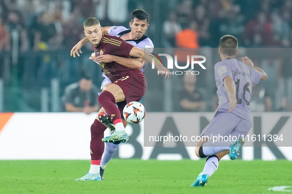 Artem Dovbyk of AS Roma and Daniel Vivian of Athletic Club compete for the ball during the UEFA Europa League 2024/25 League Phase MD1 match...